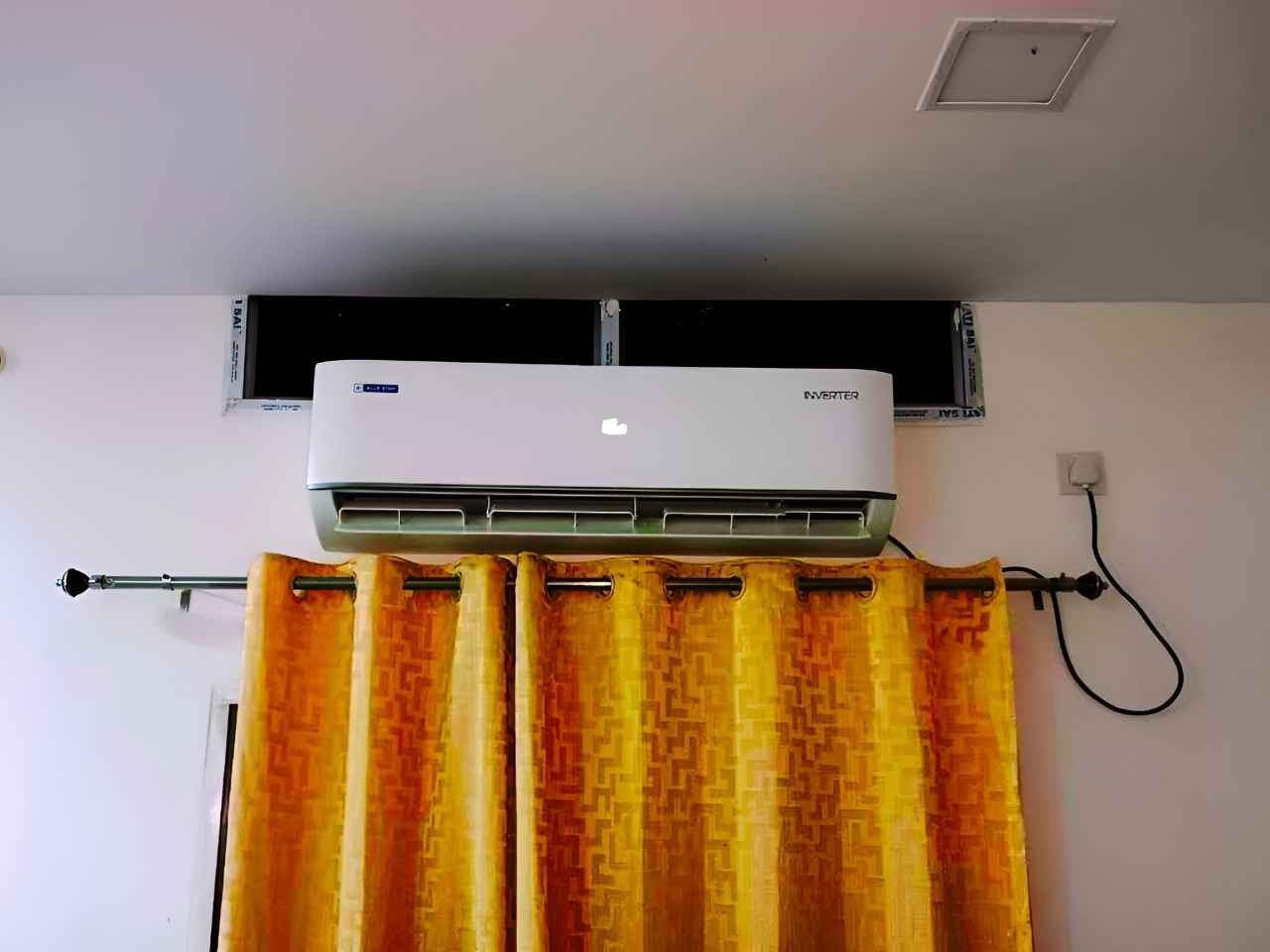 Blue Star 2 Ton 3 Star IE324DNU inverter split AC indoor unit running at full speed with the air flap fully open, wall-mounted