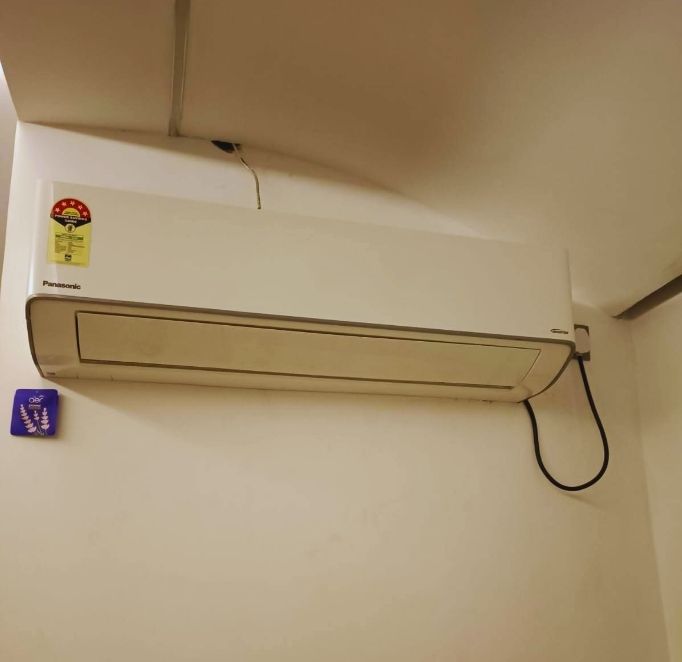 Close view of Panasonic 1 Ton 5 Star split AC indoor unit (CS/CU-NU12AKY5W) mounted on wall