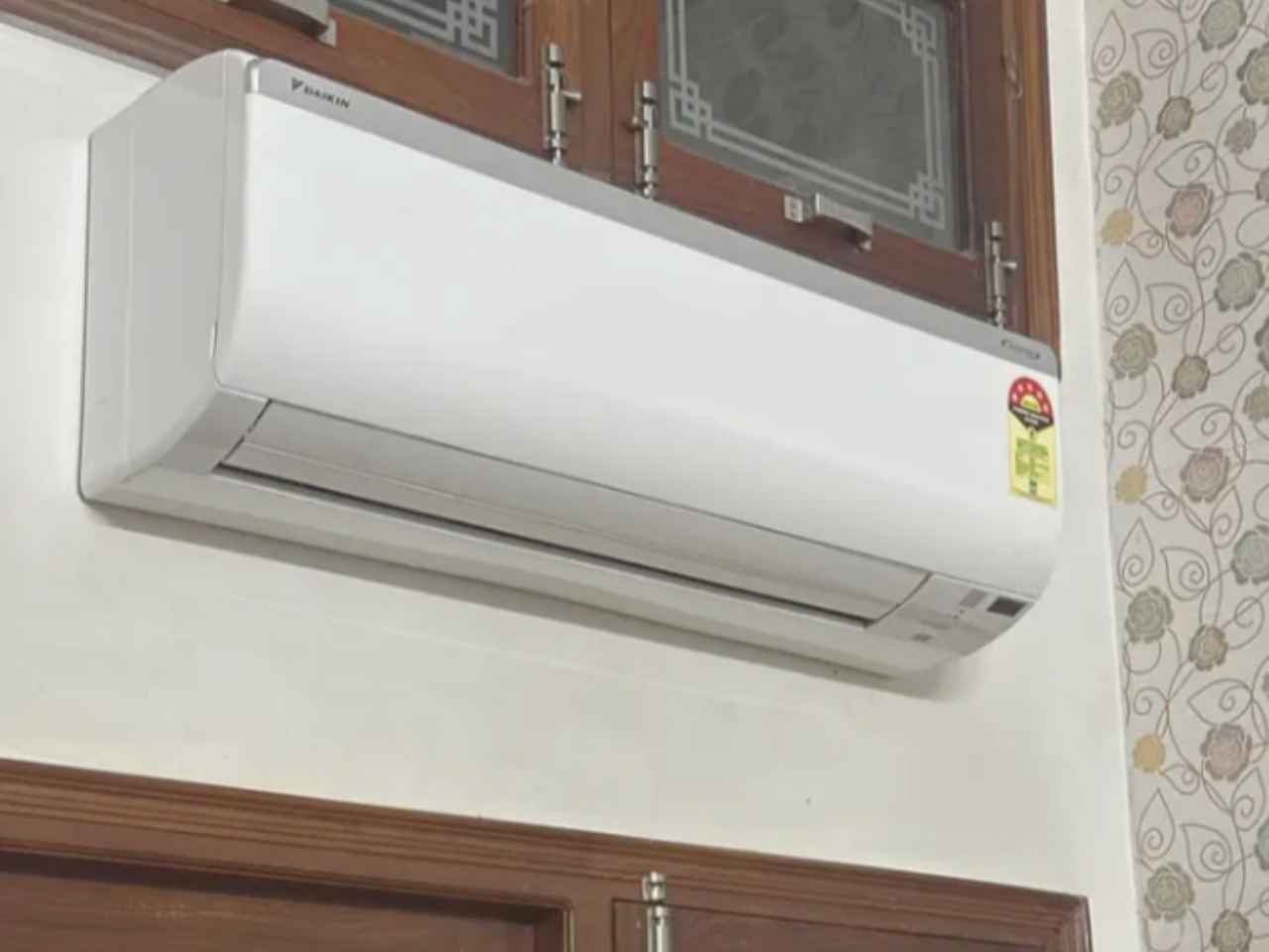 Close-up view of Daikin 1 Ton 5 Star split air conditioner indoor unit (Model FTKM35U), showing the front panel