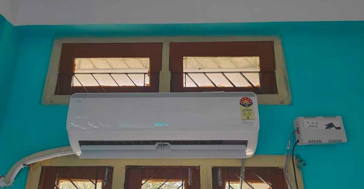 Running Voltas 125V Vectra Elite 1 Ton 5 Star AC indoor unit showing maximum airflow position with fully open flap and hidden display